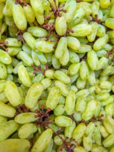 Vibrant and juicy green grapes in a cluster, perfect for healthy eating and nutrition.